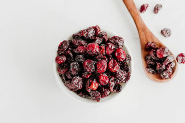 Dried cranberries in a bowl top down photo